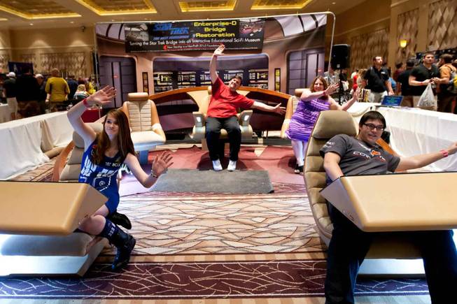 Attendees act while sitting in the Bridge booth at the Official Star Trek Convention at the Rio in Las Vegas on Saturday, Aug. 10, 2013.